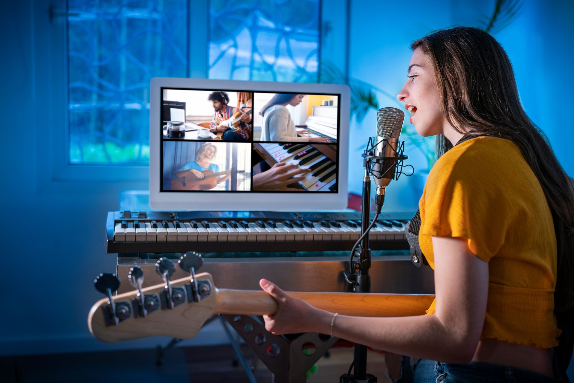 Brunette teen musician singer girl singing and playing bass guitar teleconference