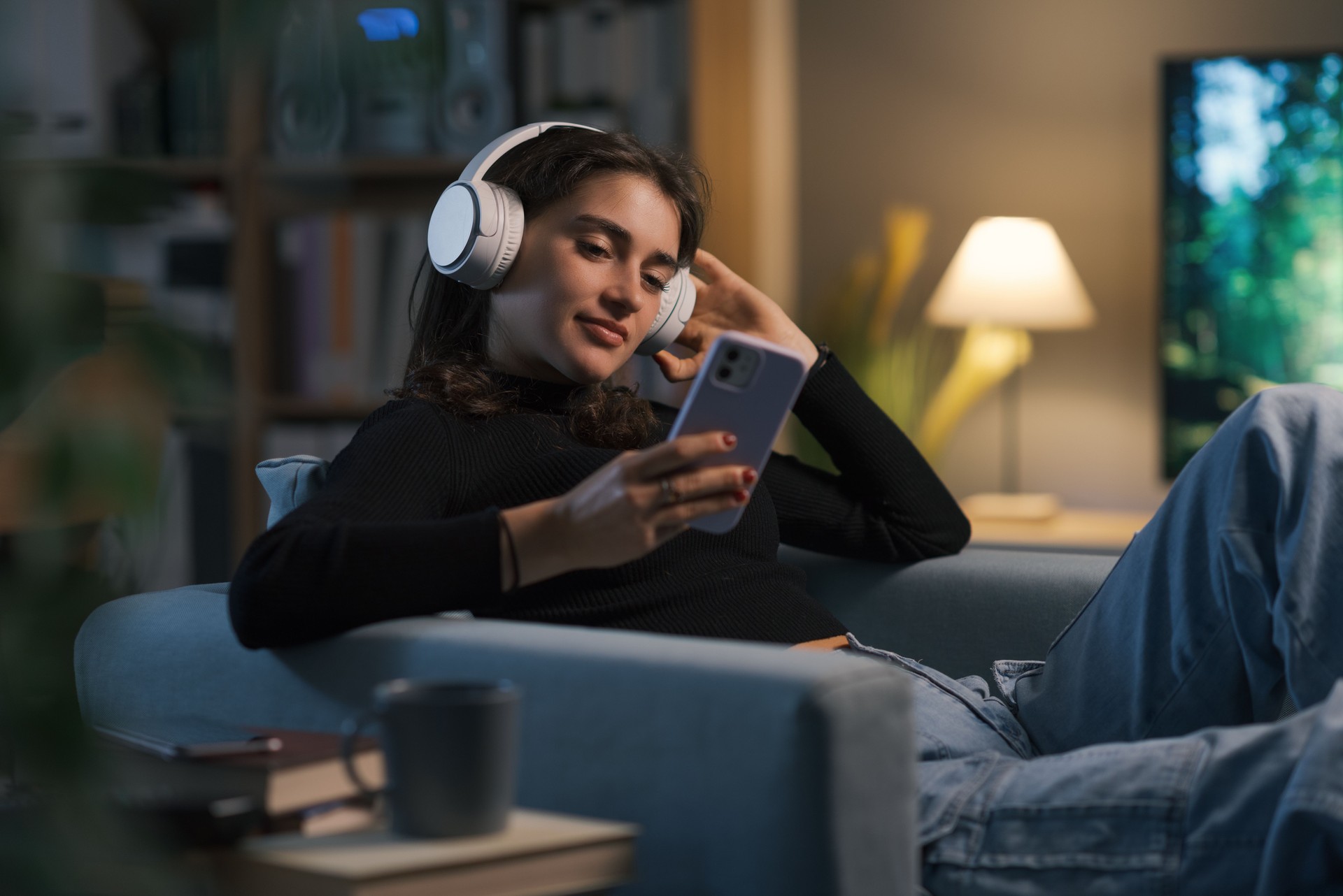 Teenager watching videos online at home