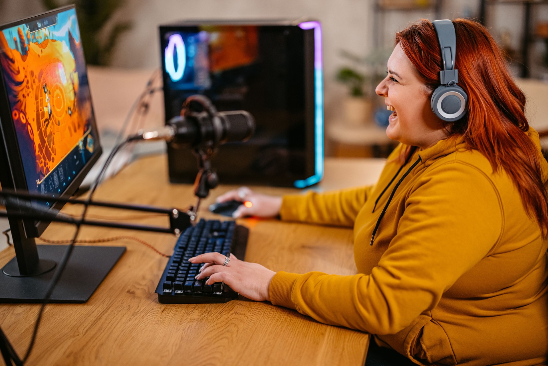 Young Woman Playing A Video Game On Her Desktop PC